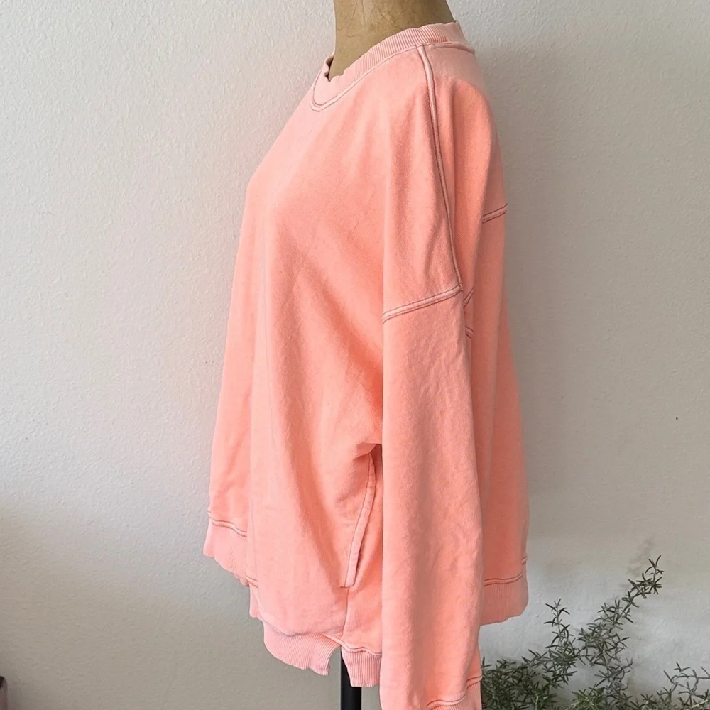 Free People Movement sz M oversized salmon pink sweatshirt great pre owned cond